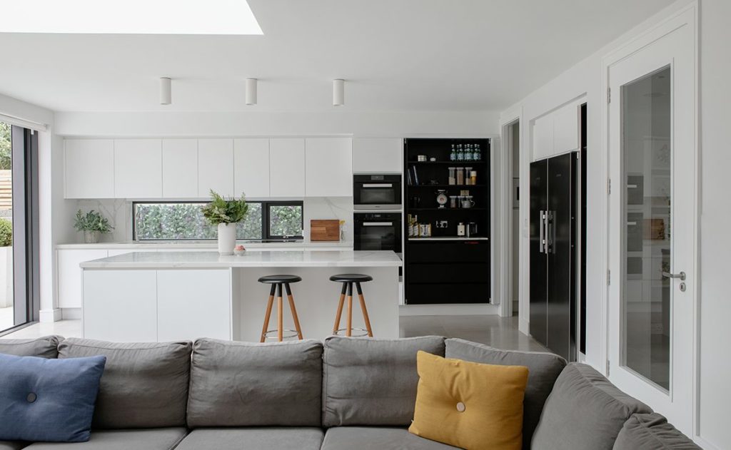 Ultraline sliding doors in modern extension architect kitchen
