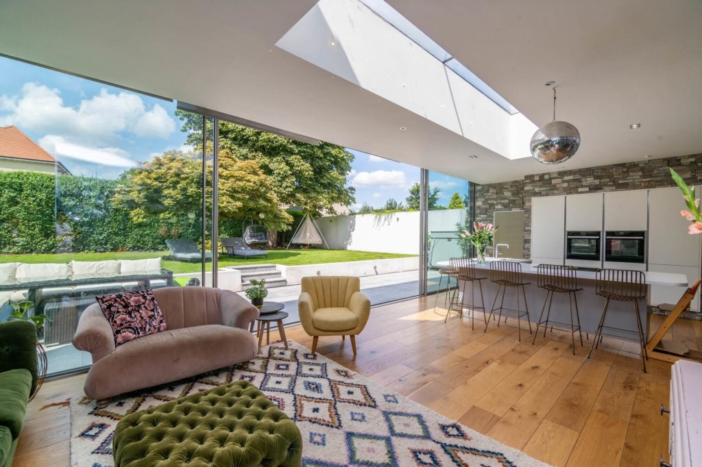 Traditional property with award winning Ultraline sliding doors in modern extension